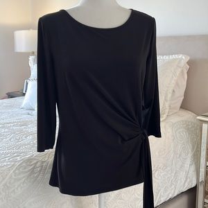 Premise black knit pull on top. Faux wrap style. Side tie. Size medium.